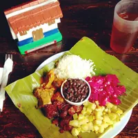 Costa Rican casado on a banana leaf
