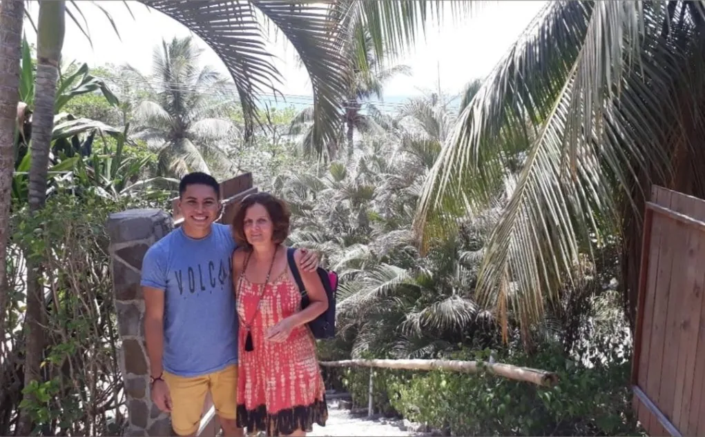 José Cardoza among palm trees on the Nicoya Peninsula, Costa Rica