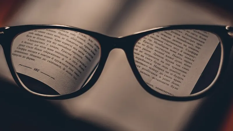 Reading glasses over the pages of a book
